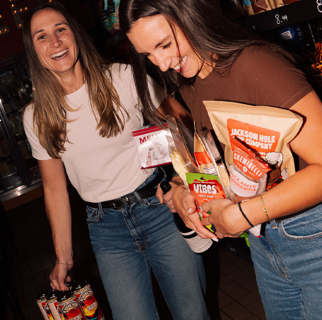 People holding groceries.